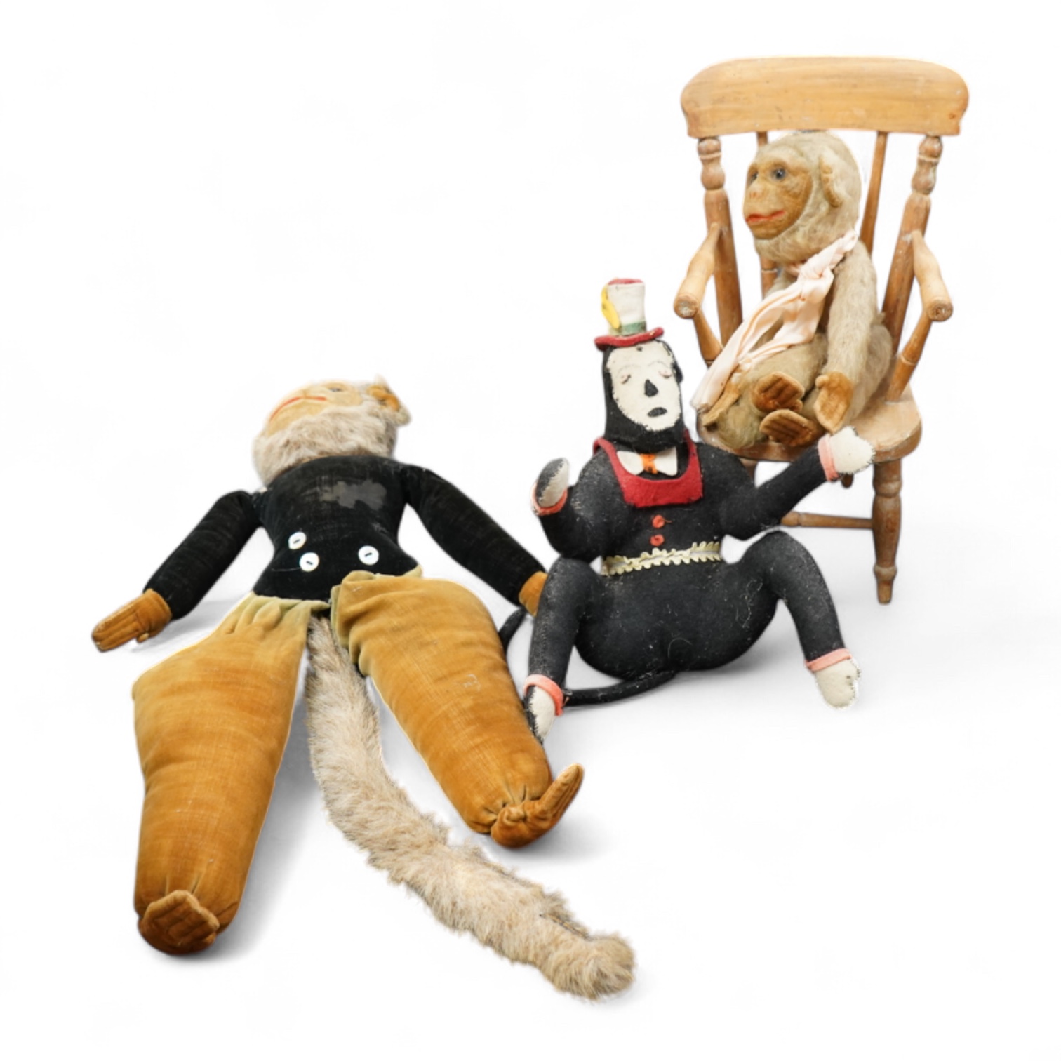 Two Nora Welling monkey soft toys, largest 38cm long and another felt made monkey together with a miniature Windsor chair and Disney Micky Mouse metal waste bin